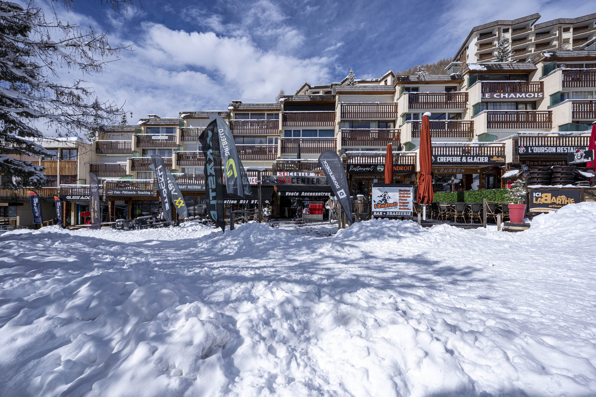 Facades of holiday residences at the foot of the slopes